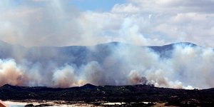 Veldvuur, Stanford, soos gesien vanaf  De Kelders.  Foto: Mario Seegers